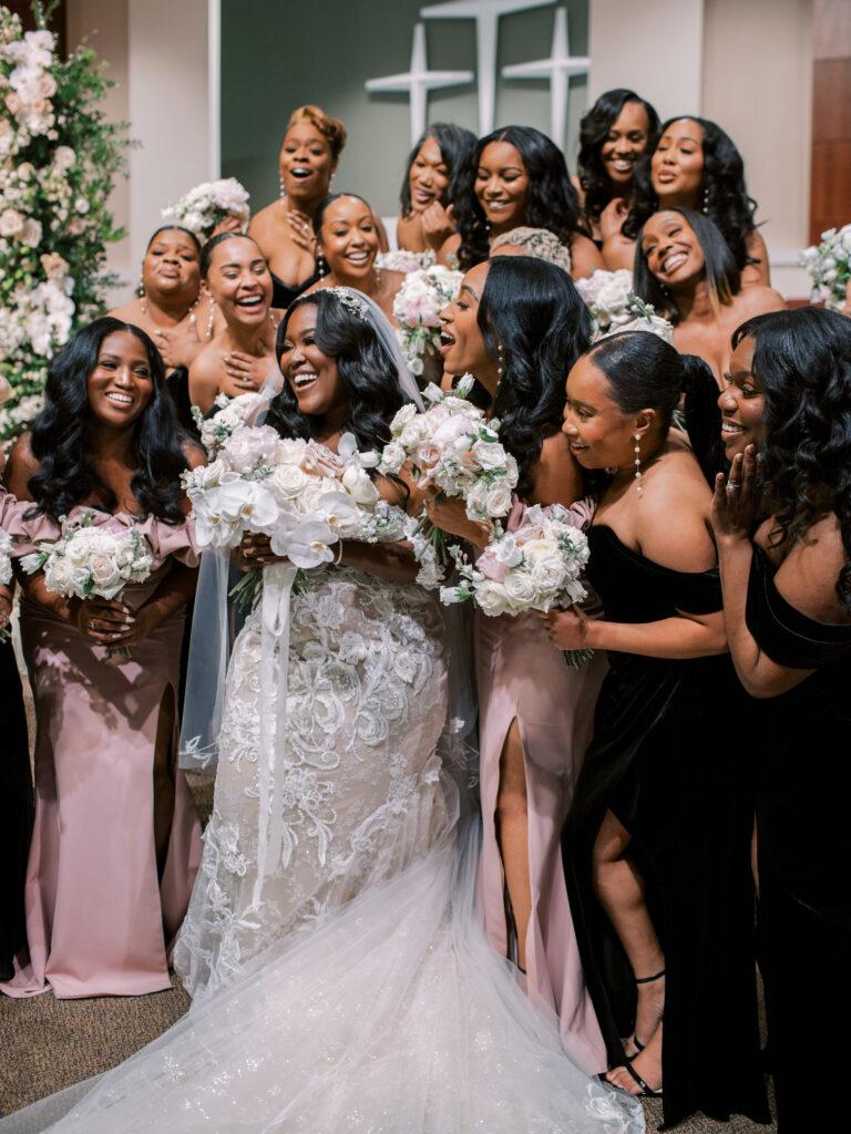 Shreveport Bride with her bridesmaids after the wedding ceremony. 